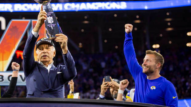 Feb 13, 2022; Inglewood, CA, USA; Los Angeles Rams owner Stan Kroenke (left) celebrates with the Lombardi Trophy alongside head coach Sean McVay after defeating the Cincinnati Bengals during Super Bowl LVI at SoFi Stadium. Mandatory Credit: Mark J. Rebilas-USA TODAY Sports